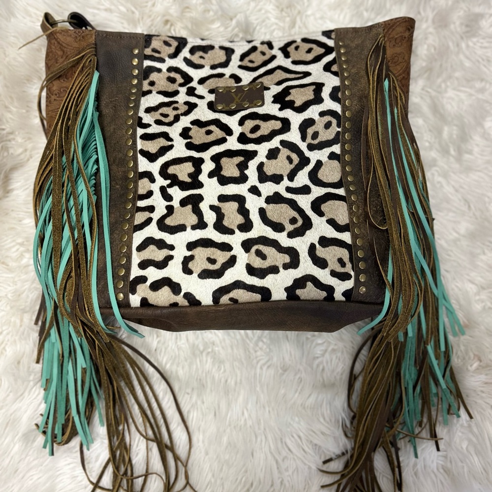 Keep it Gypsy leather, cow fur, fringe totes w/ genuine LV patch work
